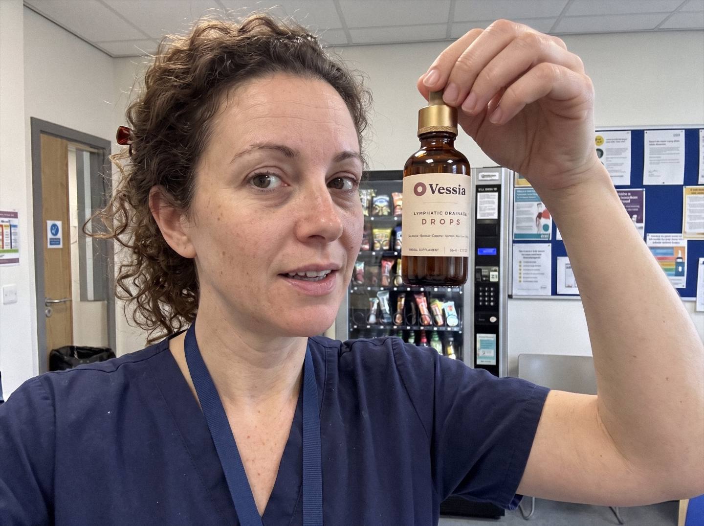 Alana W. holding Vessia Lymphatic Drainage Drops