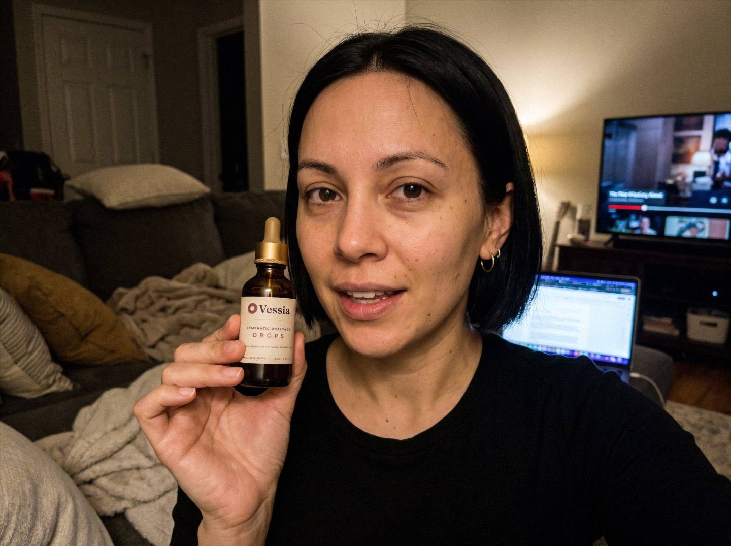 Hannah L. holding Vessia Lymphatic Drainage Drops